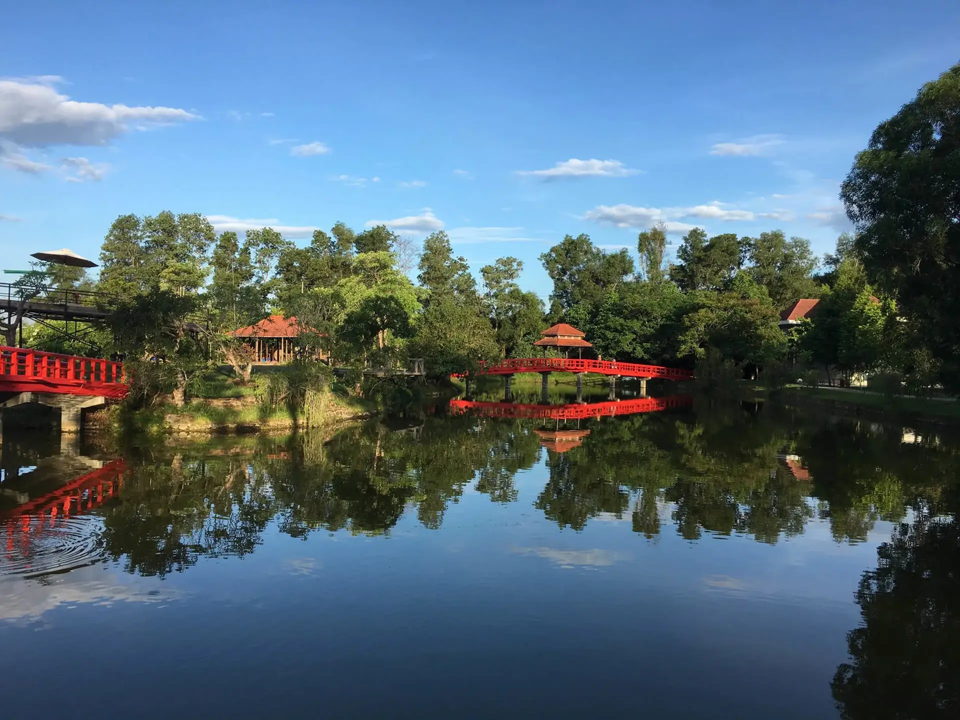 A quiet reflection over water in Alba Wellness Valley Hue