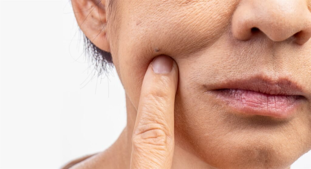 Close-up of wrinkled skin on an older woman’s face